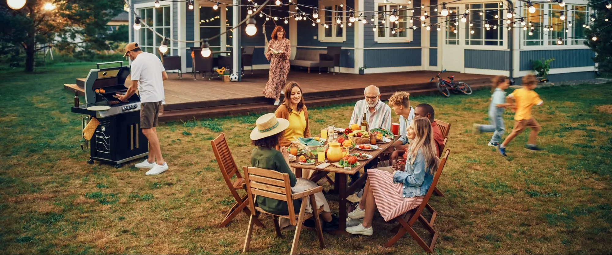 Family having dinner in the backyard